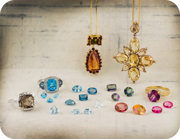 Group of topaz gems and jewelry