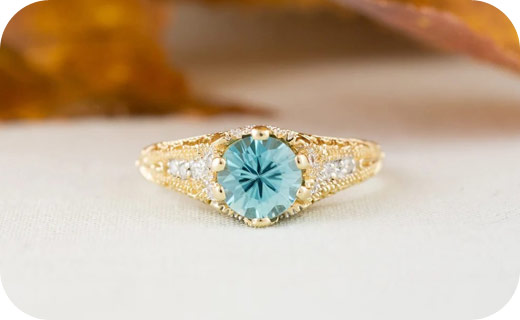 Yellow gold and blue zircon ring on Etsy