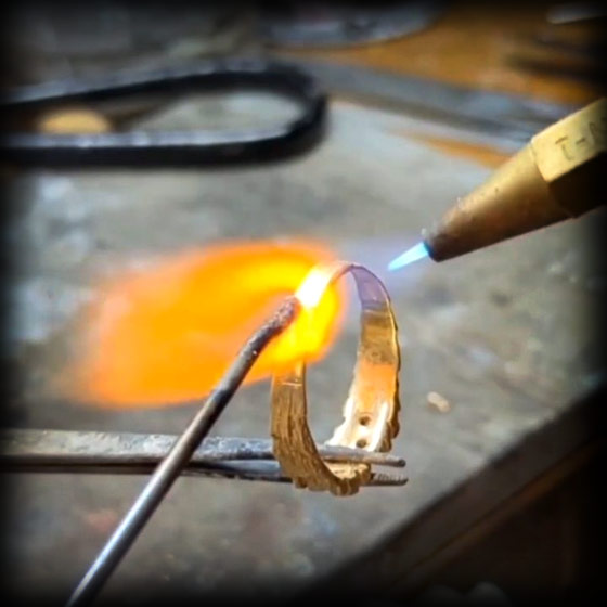Torch being used to size a ring