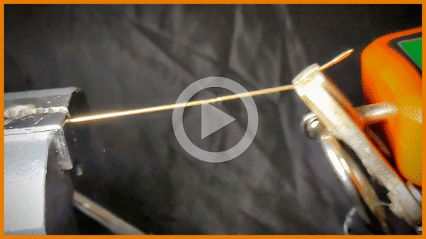 A slow motion shot of a chain breaking