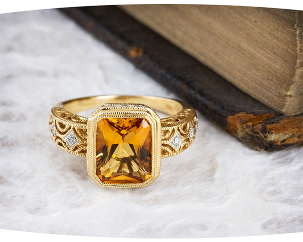 Yellow gold ring with radiant cut Citrine center stone