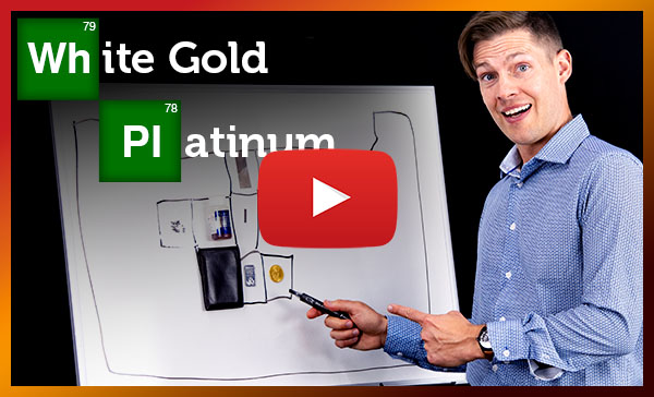 Angelo in front of a white board explaining white gold vs platinum chemistry