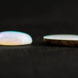 A full opal next to a doublet opal