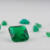 Group of loose emerald gemstones