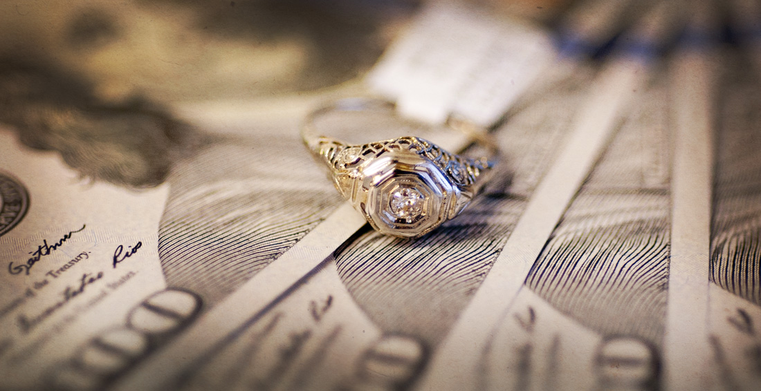 At Auction: A 14ct yellow gold Chanel set Diamond ring.