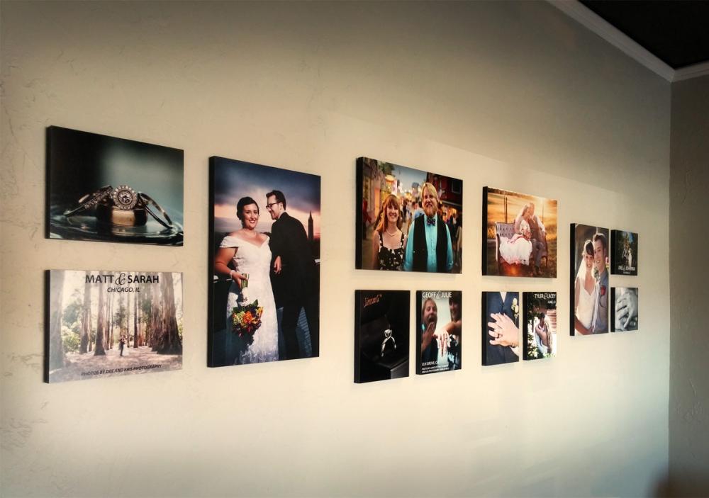 Arden Jewelers showroom wall engagement and wedding photos