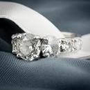 Diamond three stone statement engagement ring - side