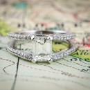 Split shank emerald cut diamond engagement ring - front
