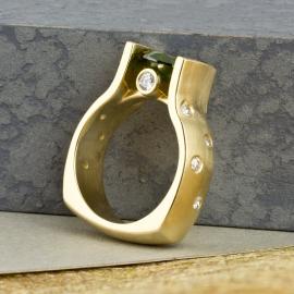 Green diamond engagement ring in yellow gold with diamond accents - side