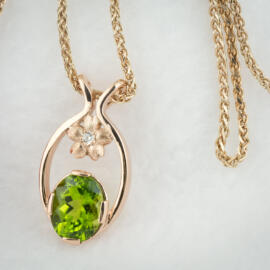 Oval peridot mothers pendant