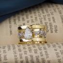 Pear cut diamond floral engagement ring - in book