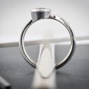 Abstract modern off center engagement ring - through