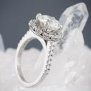 Round diamond halo engagement ring - perspective