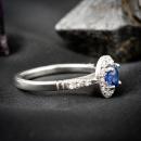 Non-traditional sapphire halo engagement ring - side
