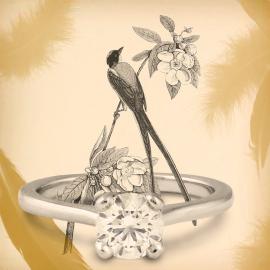Diamond solitaire engagement ring with artistic bird illustration