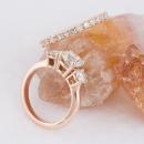 Rose gold three stone ring with diamond band - side