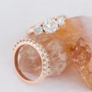 Rose gold three stone ring with diamond band - front