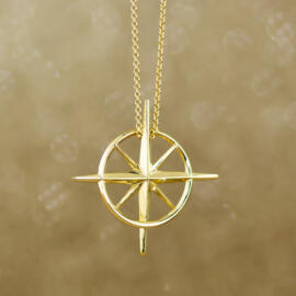 yellow gold true north necklace front view hanging