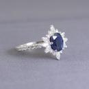 Sapphire Engagement Ring with Starburst Diamond Halo