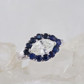 Marquise Diamond Engagement Ring with Sapphire Halo