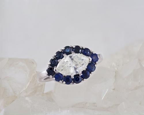 Marquise Diamond Engagement Ring with Sapphire Halo