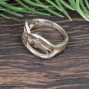 Custom horse white gold band side view with metal stamp