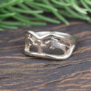 Custom horse white gold band angle view of ring