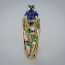side of ring with emeralds and bamboo metal work