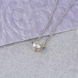 Modern White Gold Necklace with Round Brilliant Diamond side view fancy
