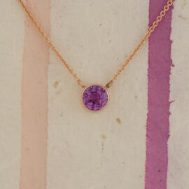 Pink Sapphire in Modern Rose Gold Bezel Necklace hanging view fancy