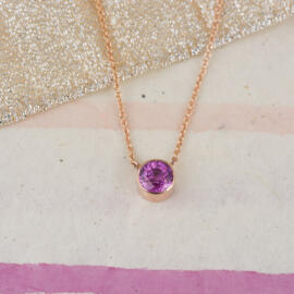 Pink Sapphire in Modern Rose Gold Bezel Necklace front view fancy