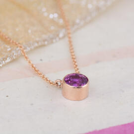 Pink Sapphire in Modern Rose Gold Bezel Necklace side view fancy