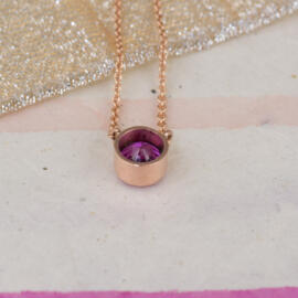 Pink Sapphire in Modern Rose Gold Bezel Necklace back view fancy