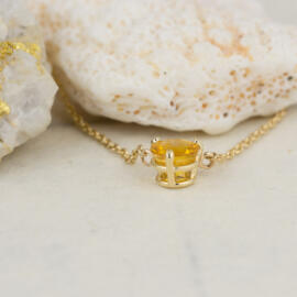 Yellow Sapphire Pendant in Simple 3 Prong Setting side view fancy