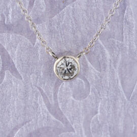 White Gold Necklace with Round Brilliant Diamond hanging view fancy