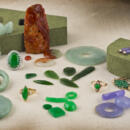 A collection of jade jewelry and loose gems