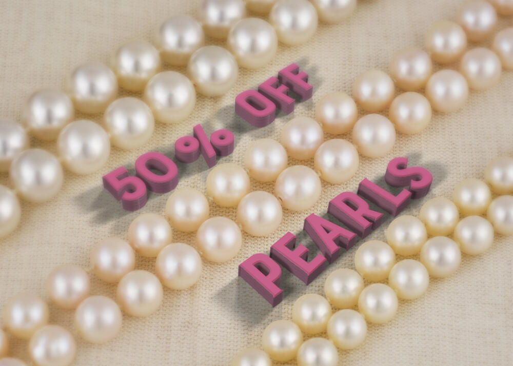 Pearl strands with text 50 percent off pearls