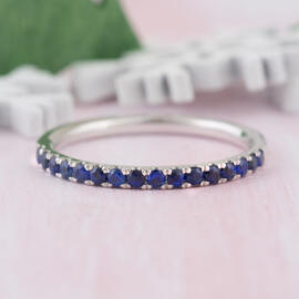 fancy background front angle blue sapphire stacking band
