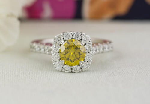 yellow center diamond cushion halo ring front angle