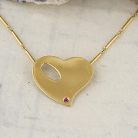 fancy background roberto coin heart necklace front view