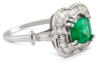 side view emerald and baguette diamond halo ring