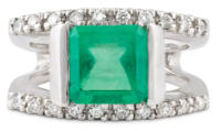 split shank diamond and emerald ring front view
