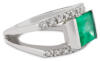 side view split shank diamond and emerald ring
