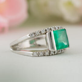 fancy background square emerald split shank left side view