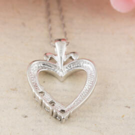 back angle fancy background three diamond heart necklace