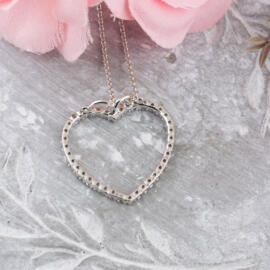 back angle fancy background open diamond heart necklace