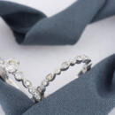 matching diamond wedding set heart background