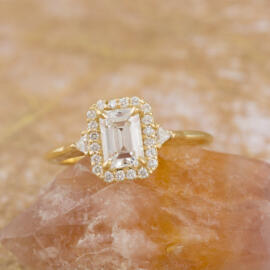 emerald cut diamond halo ring front view