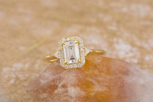 emerald cut diamond halo ring front view