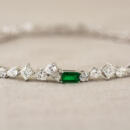 close up platinum,diamond, emerald tennis bracelet